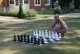 Бабушка зазывает внучат играть в шахматы